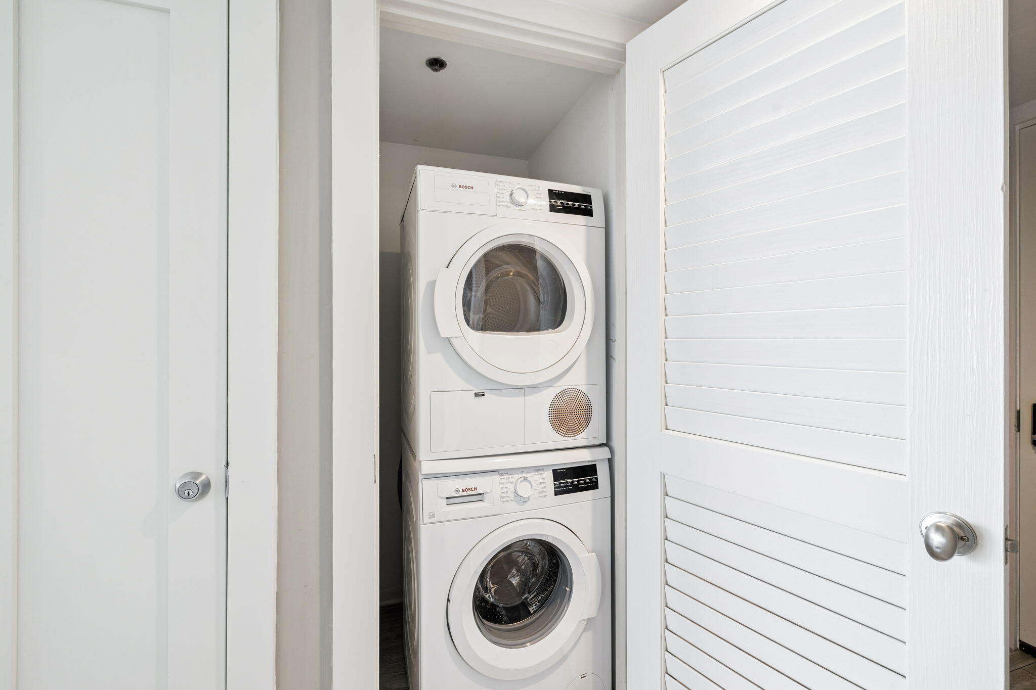 4100 East County Highway 30A, Unit 1004 Santa Rosa Beach, FL 32459 - Photo 28 of 48 a utility room with dryer and washer