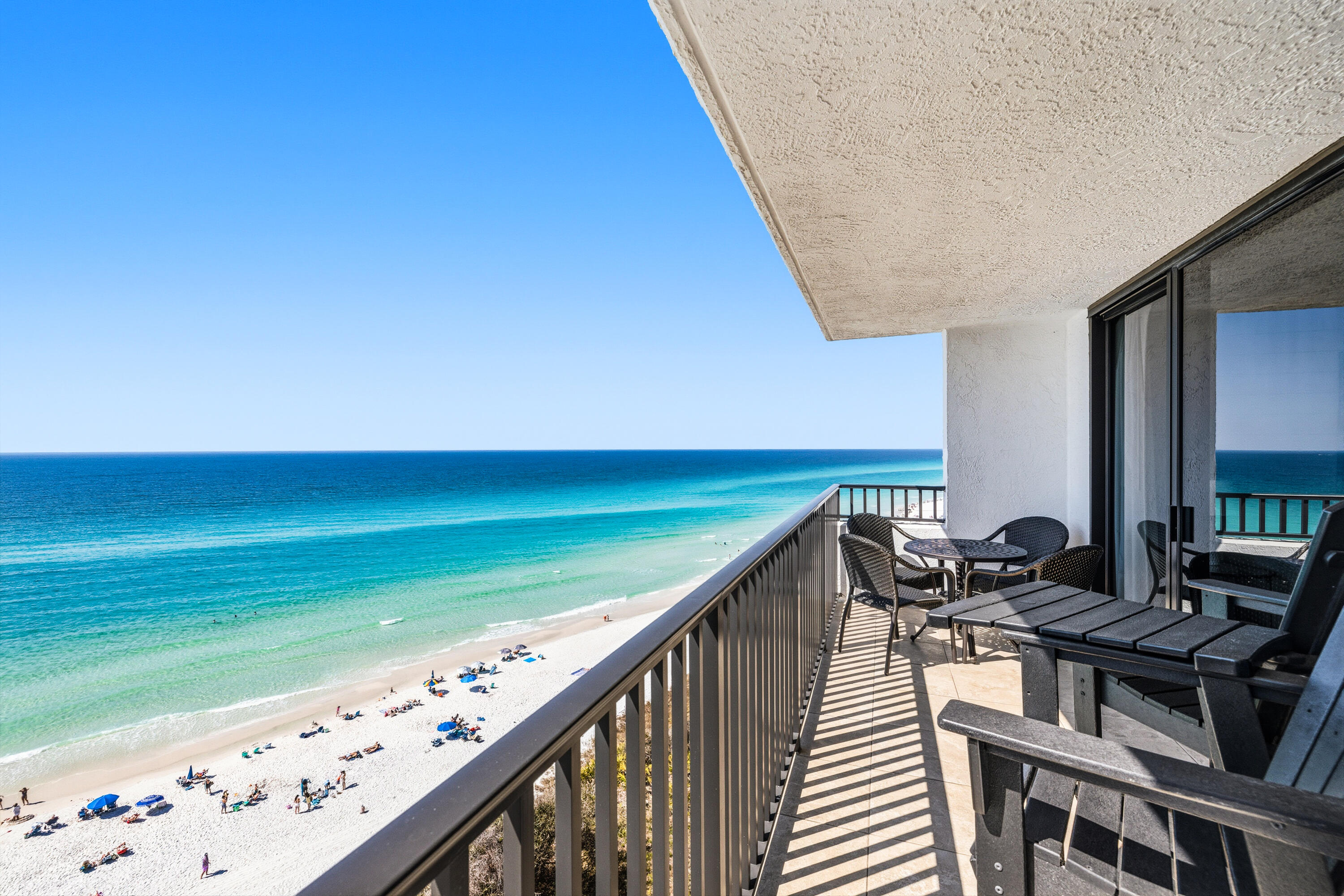 4100 East County Highway 30A, Unit 1004 Santa Rosa Beach, FL 32459 - Photo 3 of 48 a balcony with wooden floor and stainless steel appliances