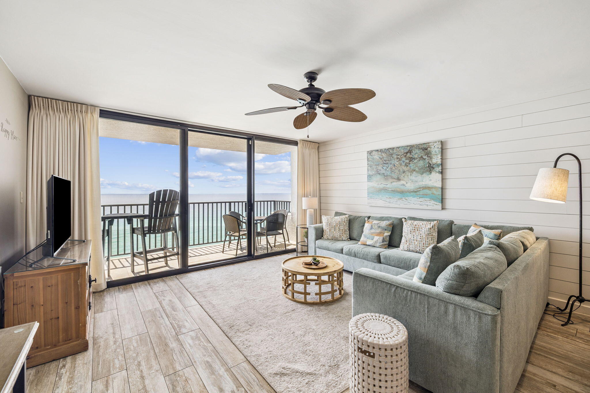 4100 East County Highway 30A, Unit 1004 Santa Rosa Beach, FL 32459 - Photo 5 of 48 a living room with furniture and a flat screen tv