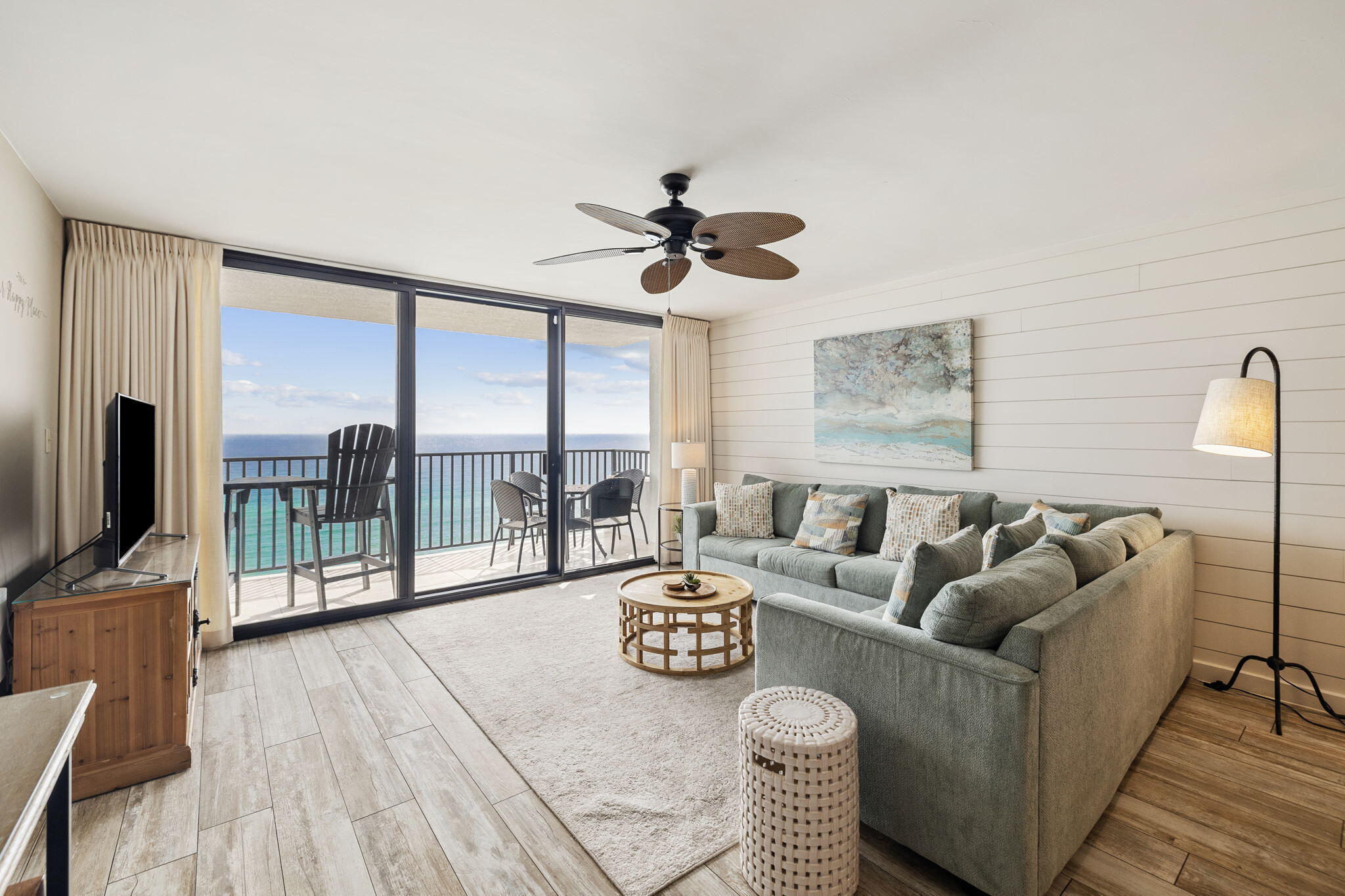 4100 East County Highway 30A, Unit 1004 Santa Rosa Beach, FL 32459 - Photo 10 of 48 a living room with furniture and a floor to ceiling window