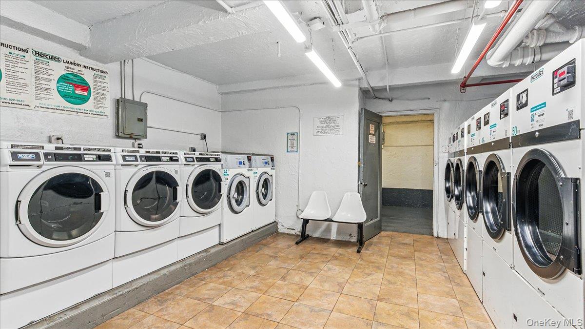 88-10 34th Avenue, Unit 5C Queens, NY 11372 - Photo 16 of 16 a utility room with dryer and washer