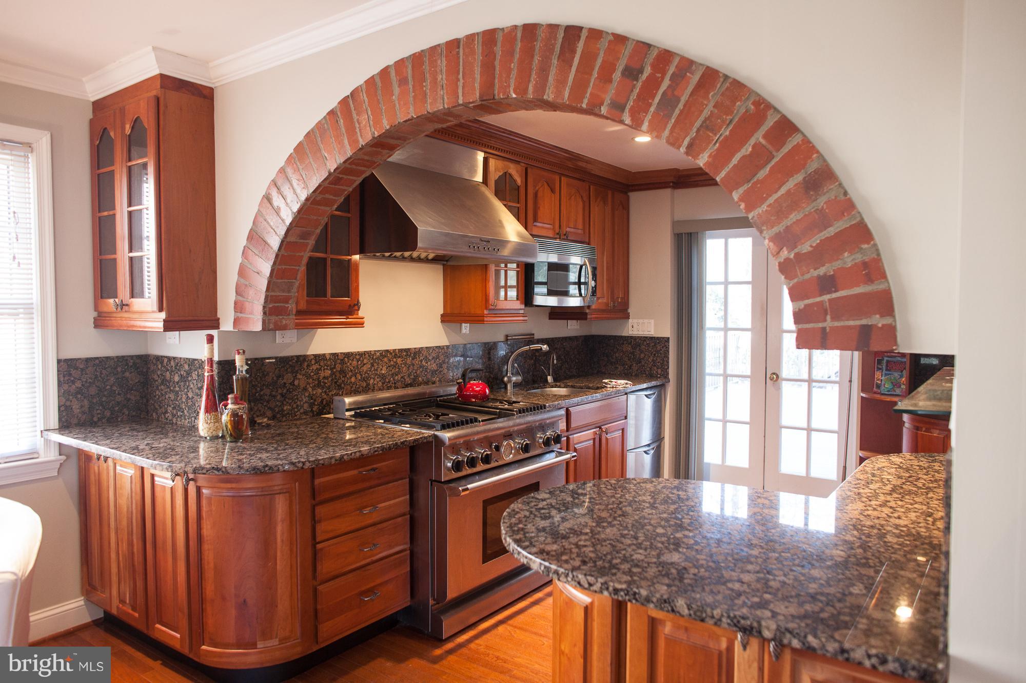 8130 Bainbridge Road Alexandria, VA 22308 - Photo 1 of 26 Kitchen w/ granite counters & cherry cabinets