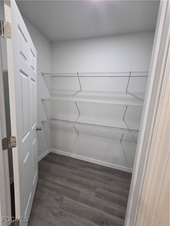 15 Hampton Avenue Lehigh Acres, FL 33936 - Photo 13 of 14 a view of a room with racks on the wall