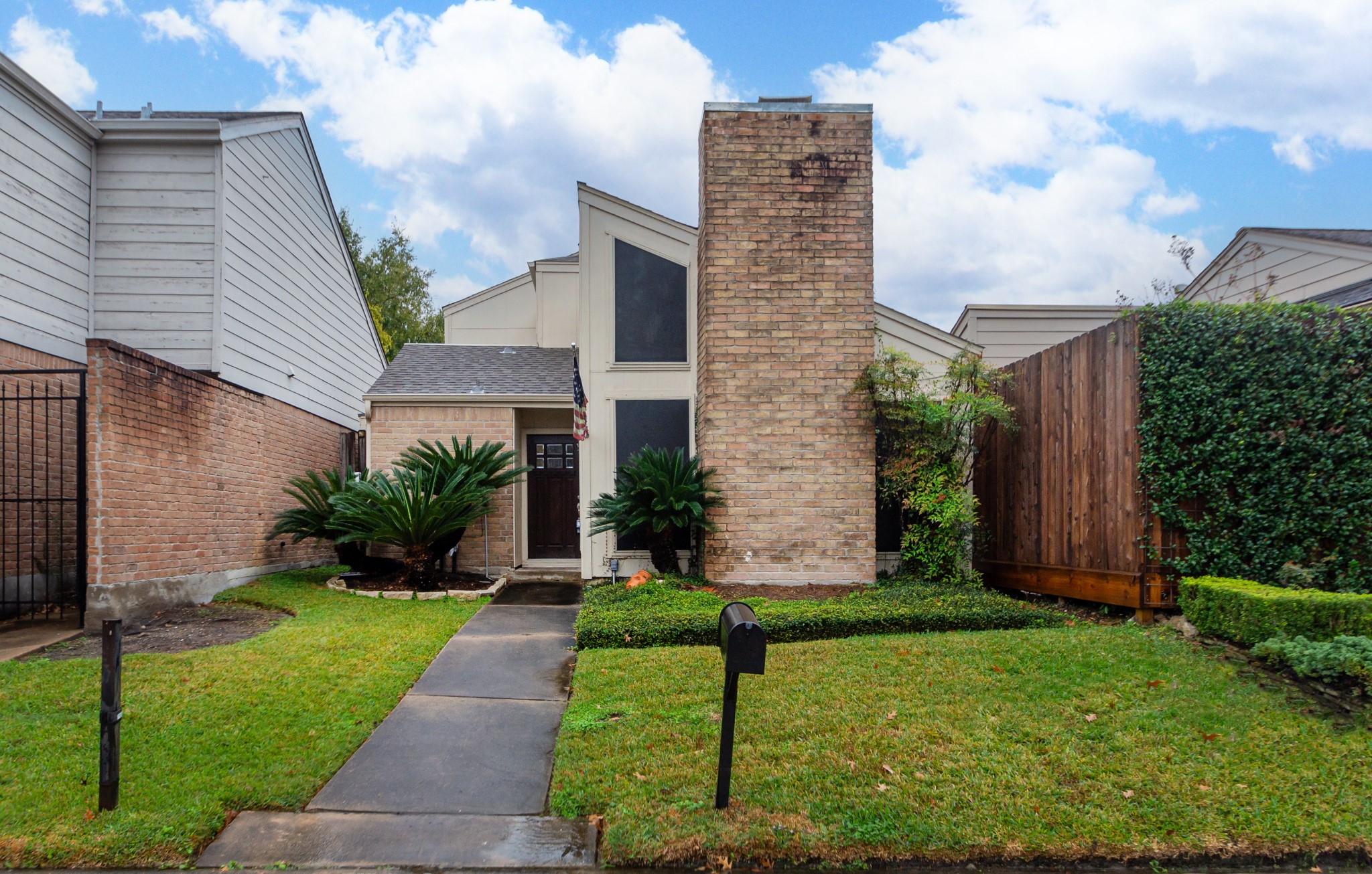 1911 Trixie Lane Houston, TX 77042 - Photo 3 of 43 a view of a house with a yard