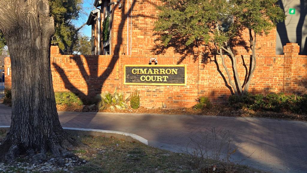 18333 Roehampton Drive, Unit 1028 Dallas, TX 75252 - Photo 1 of 8 a view of a street with a trees