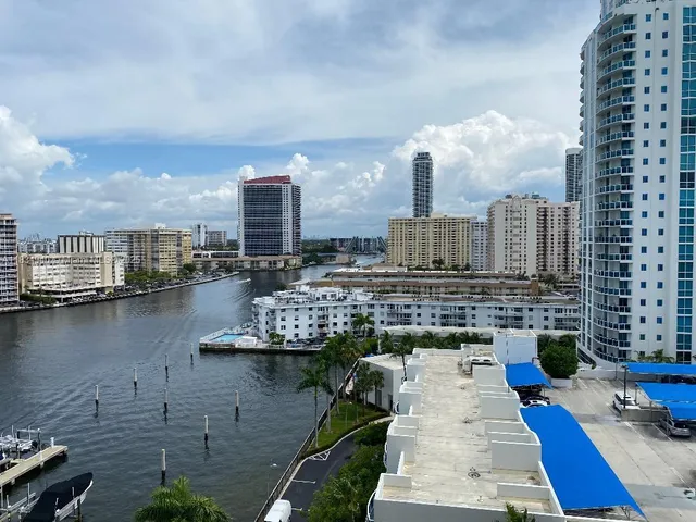a view of a city with tall buildings