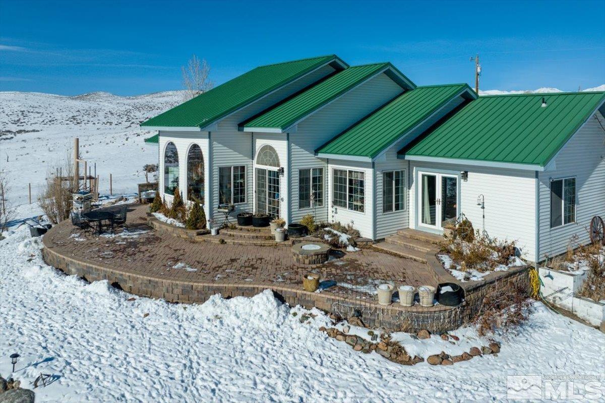 12803 North Red Rock Road Reno, NV 89508 - Photo 1 of 40 a view of a house with backyard