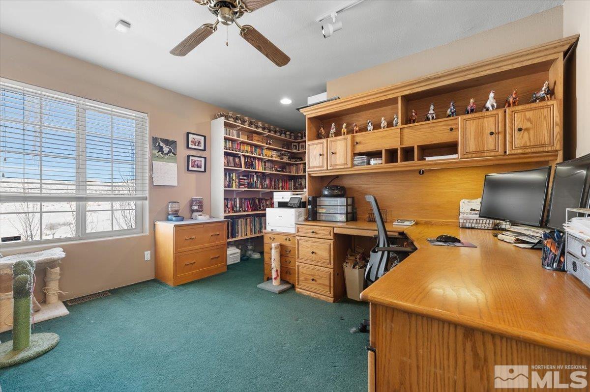 12803 North Red Rock Road Reno, NV 89508 - Photo 24 of 40 a workspace with furniture