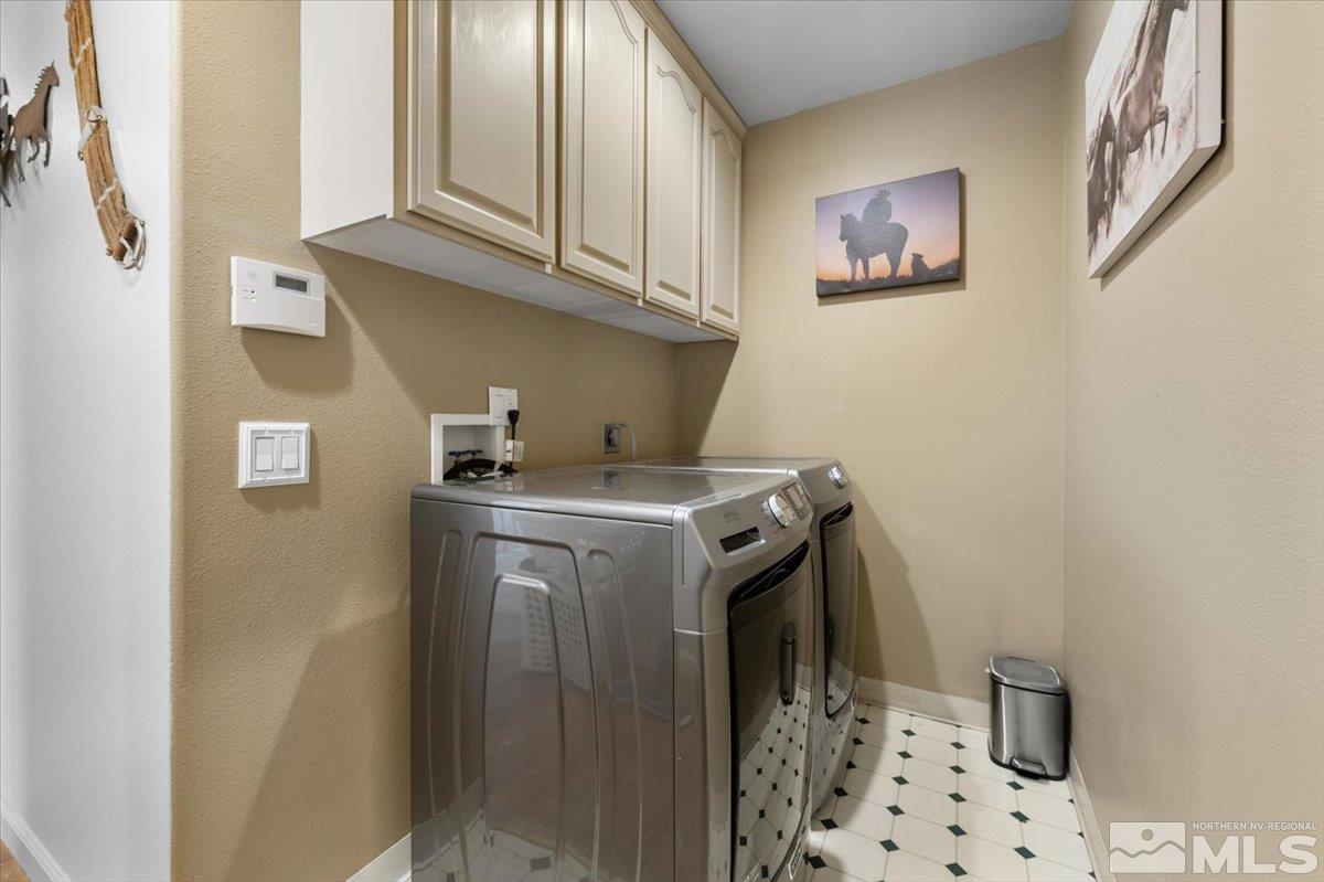 12803 North Red Rock Road Reno, NV 89508 - Photo 28 of 40 a utility room with dryer and washer
