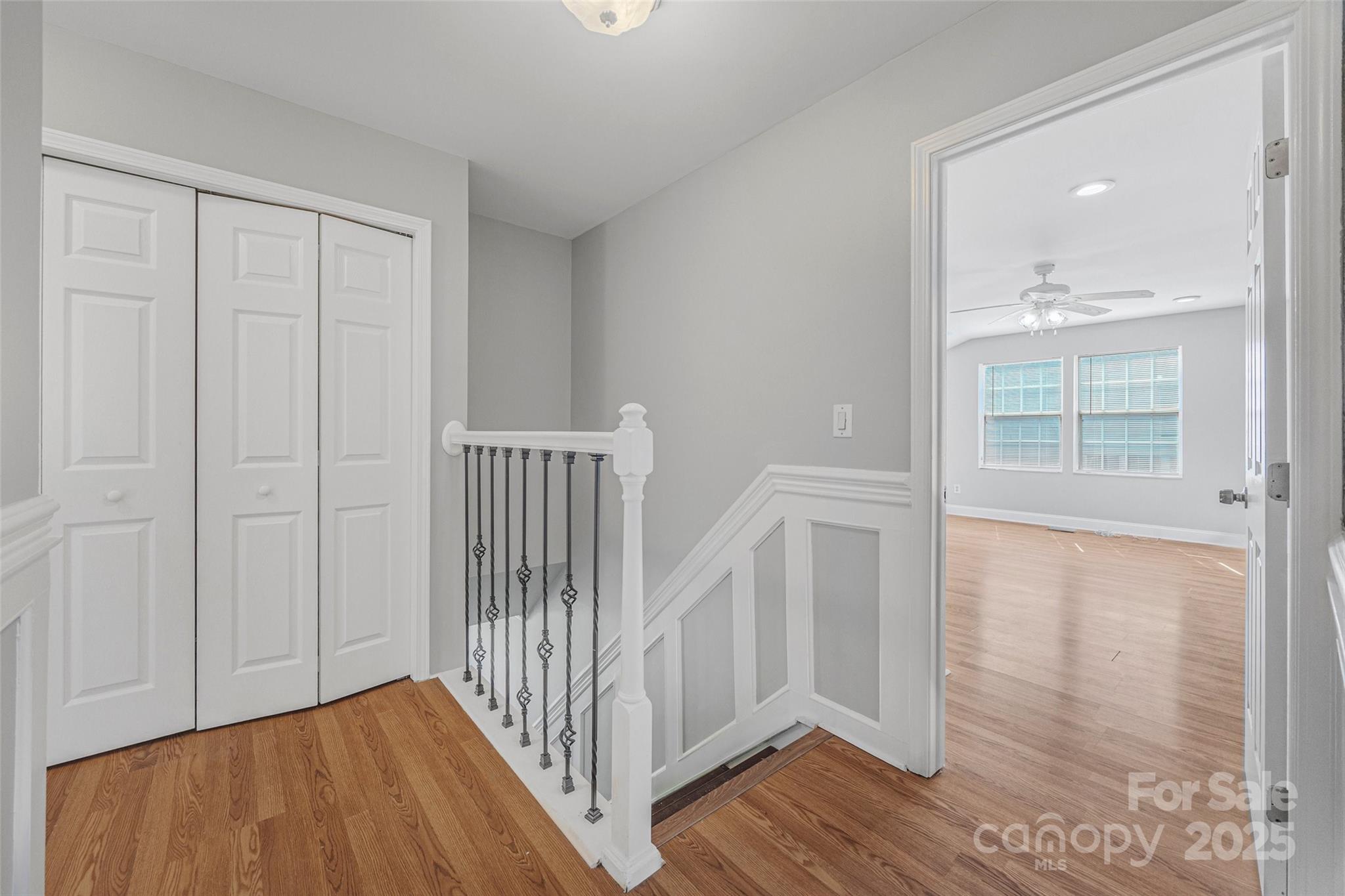 12662 Woodside Falls Road Pineville, NC 28134 - Photo 17 of 47 a view of a hallway with wooden floor and entryway