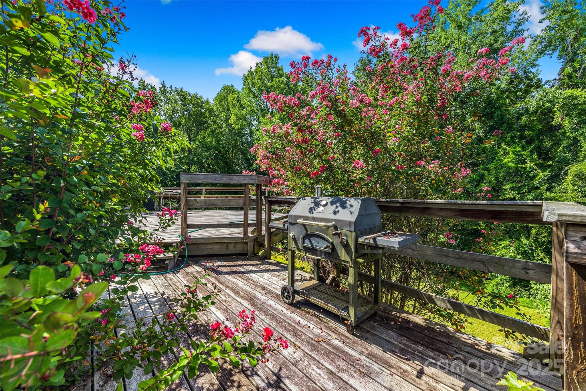 12662 Woodside Falls Road Pineville, NC 28134 - Photo 36 of 47 a view of a bench in the garden