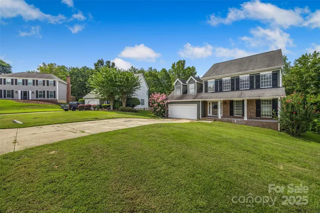 a view of a park with large trees