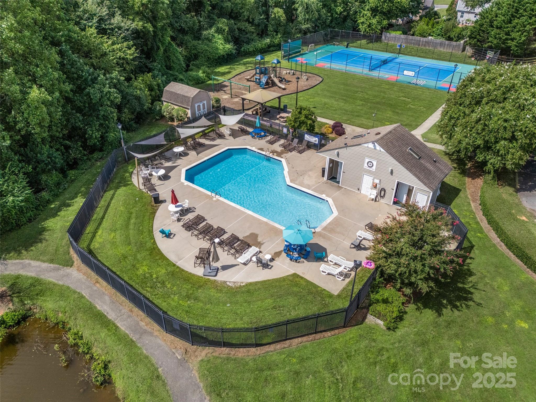 12662 Woodside Falls Road Pineville, NC 28134 - Photo 43 of 47 an aerial view of a house