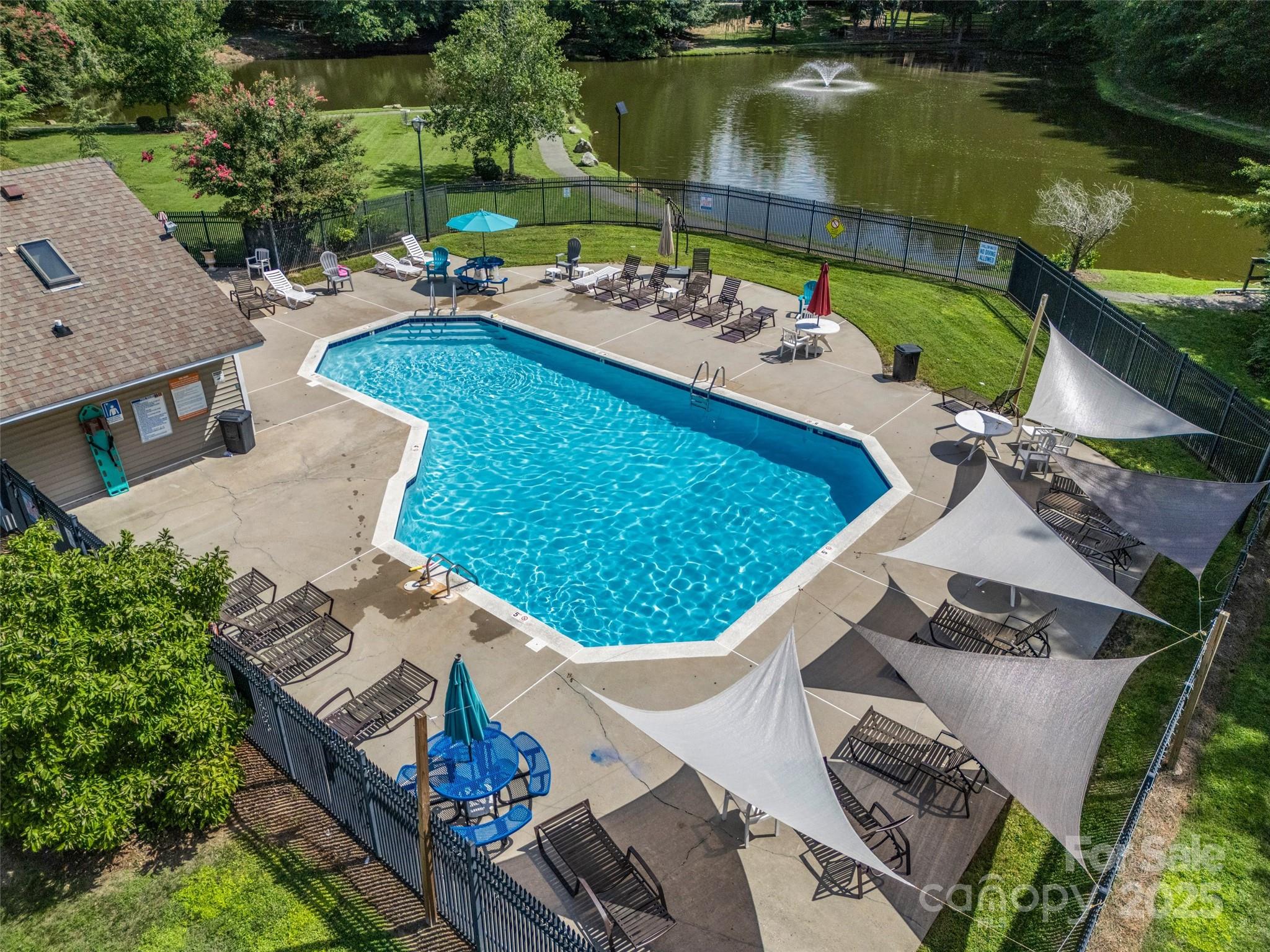 12662 Woodside Falls Road Pineville, NC 28134 - Photo 45 of 47 an aerial view of a house with lake view