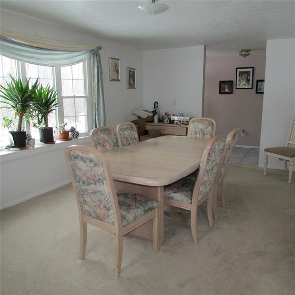 The formal dining area for those holidays and a great bay window. 
