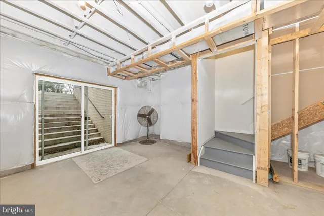 a view of an empty room with a balcony