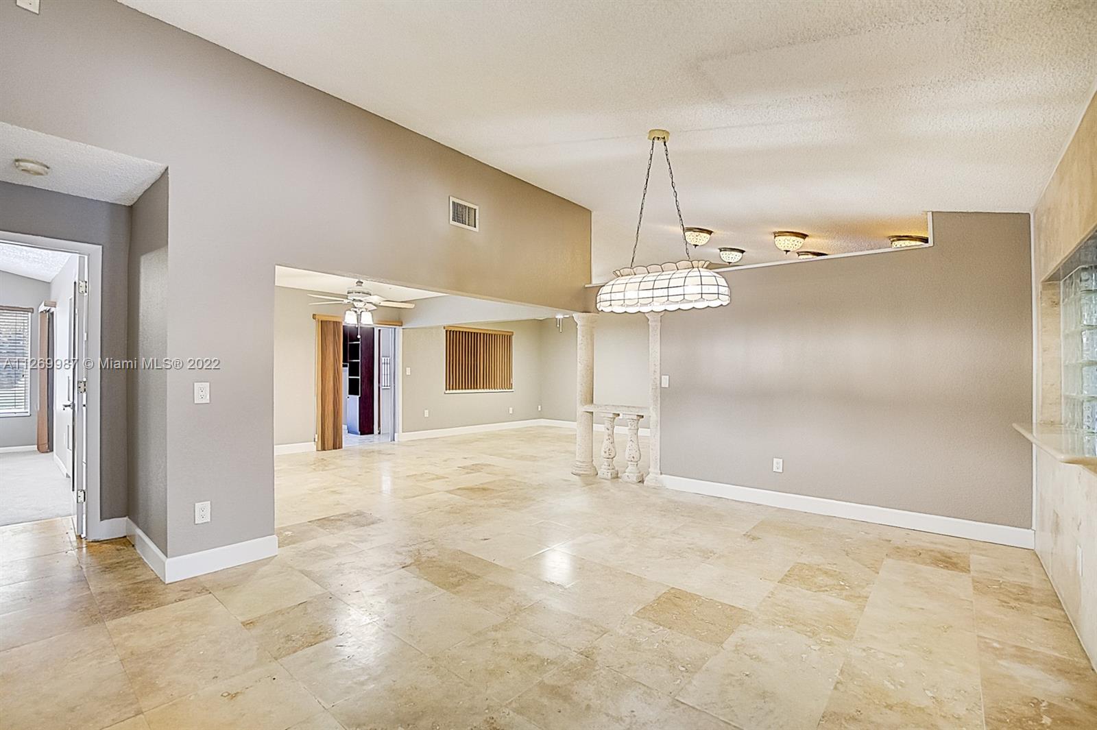 15540 Southwest 156th Avenue Miami, FL 33187 - Photo 5 of 37 a view of an empty room