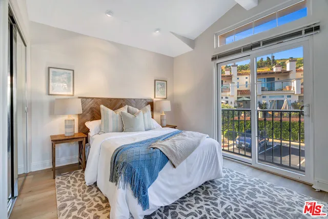 a bed room with a bed and a couch