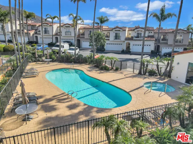 a view of a house with a swimming pool