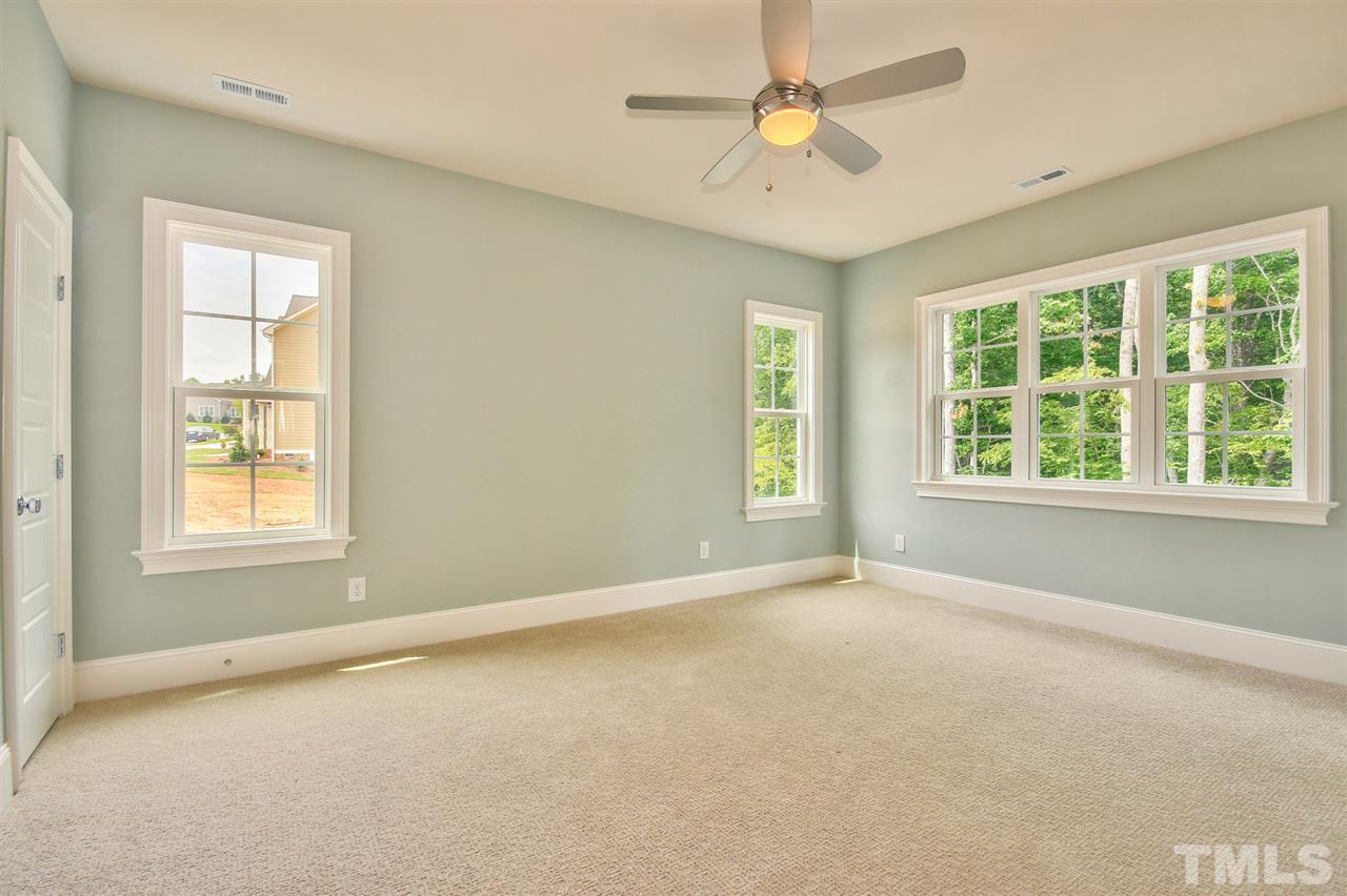 116 Roseroot Court Holly Springs, NC 27540 - Photo 15 of 25 Great Bonus Room with closet for storage of toys/games.