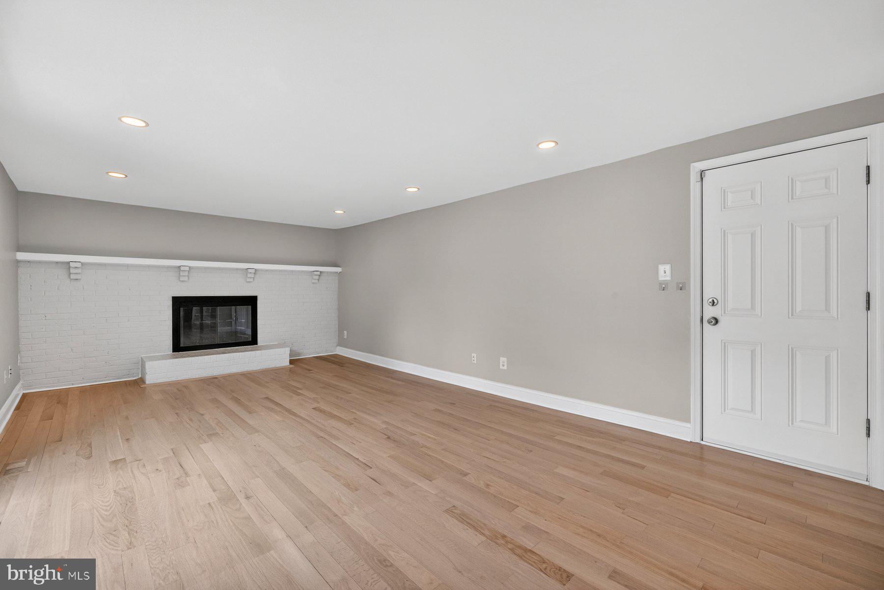 7518 Candytuft Court Springfield, VA 22153 - Photo 14 of 47 a view of empty room with wooden floor