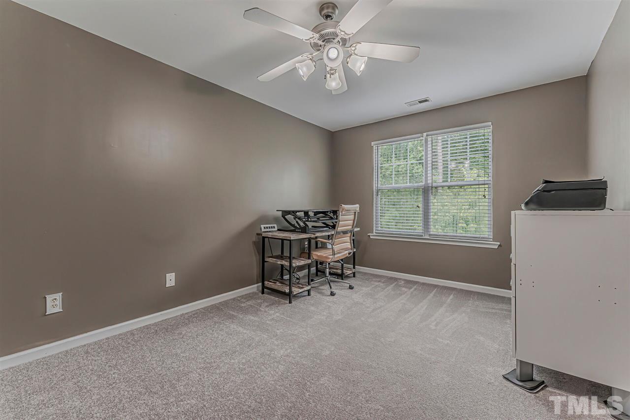 5903 Hourglass Court Raleigh, NC 27612 - Photo 23 of 29 a workspace with furniture and a window