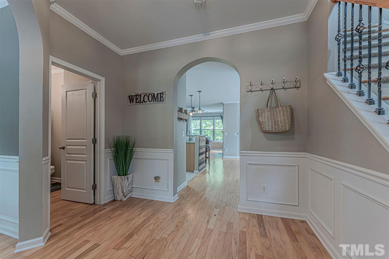 5903 Hourglass Court Raleigh, NC 27612 - Photo 8 of 29 a view of empty room with wooden floor