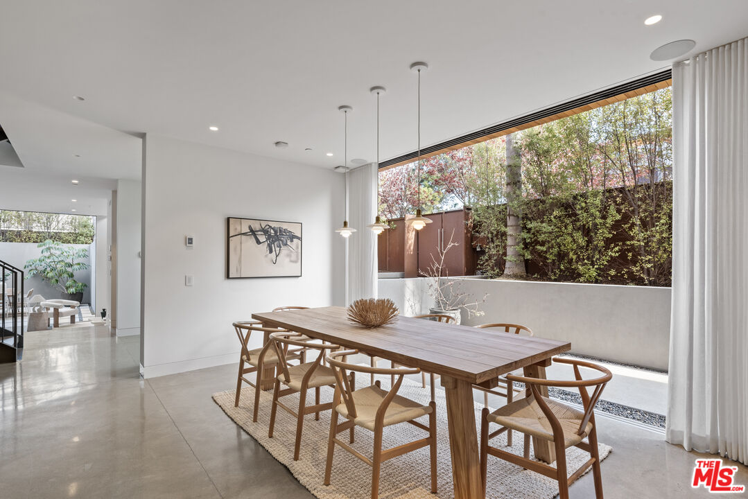 1601 Shell Avenue Venice, CA 90291 - Photo 14 of 61 a view of a dining room with furniture window and outside view