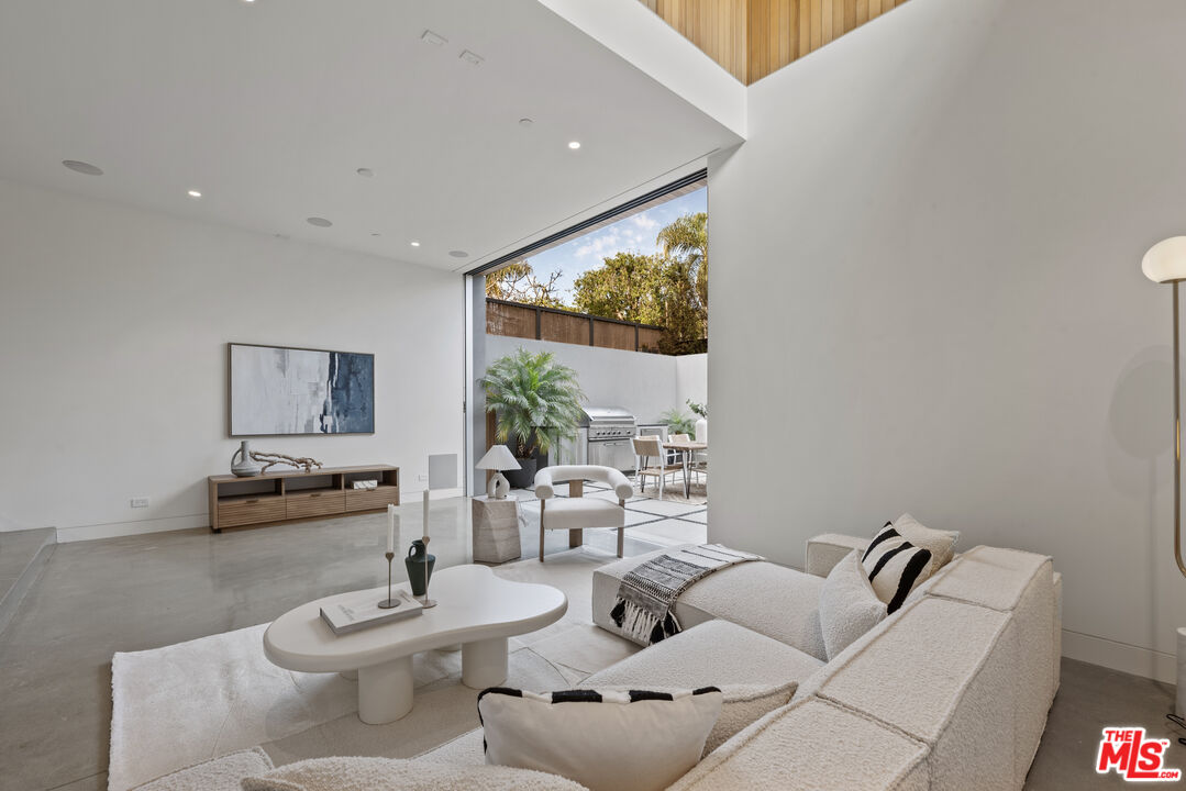 1601 Shell Avenue Venice, CA 90291 - Photo 3 of 61 a living room with furniture and a large window
