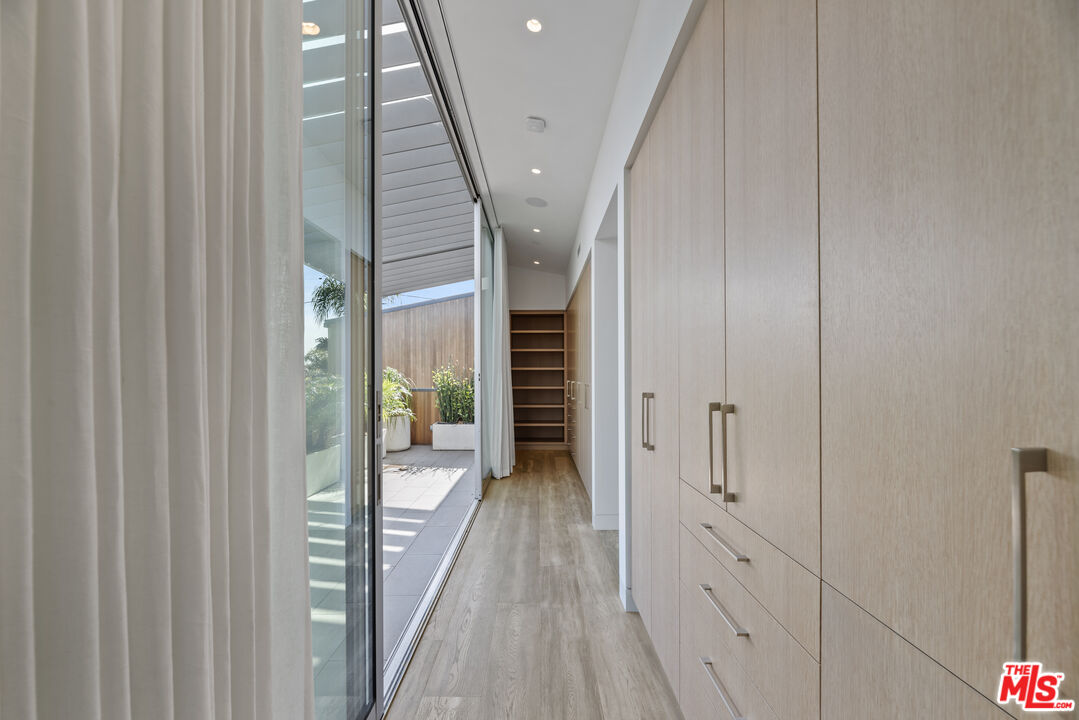 1601 Shell Avenue Venice, CA 90291 - Photo 41 of 61 a view of a hallway with wooden floor and staircase