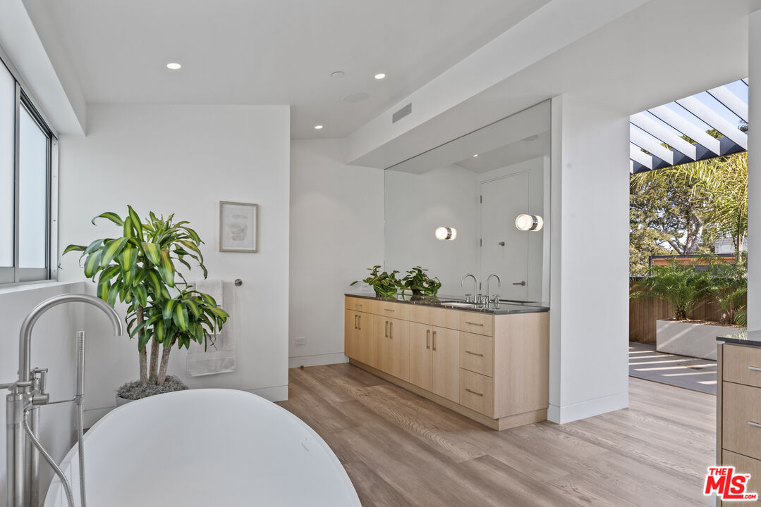 1601 Shell Avenue Venice, CA 90291 - Photo 44 of 61 a kitchen with a potted plant in front of it