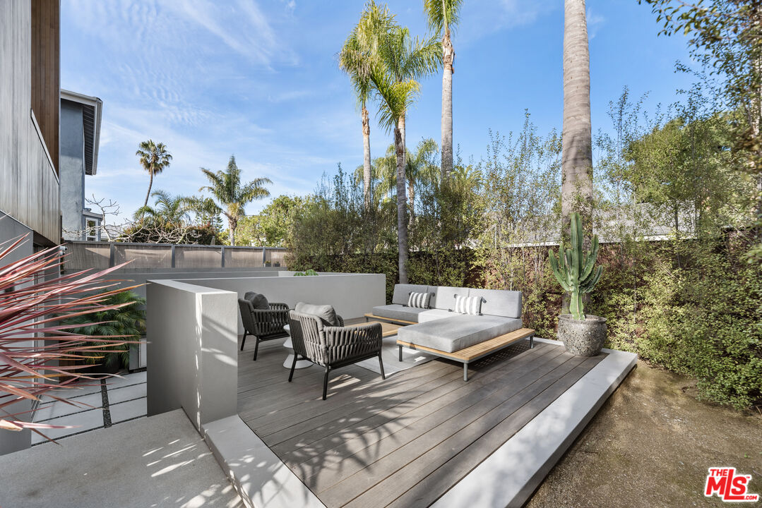 1601 Shell Avenue Venice, CA 90291 - Photo 9 of 61 a view of a patio with couches table and chairs and potted plants