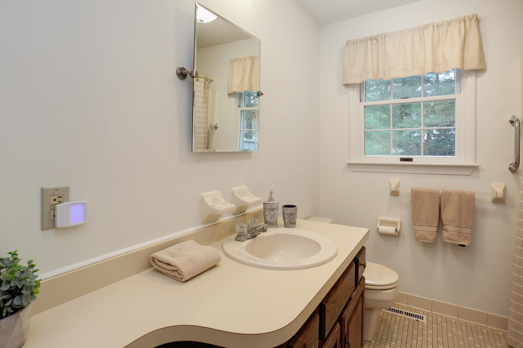 2 Timberknoll Road Pocasset, MA 02559 - Photo 11 of 26 a bathroom with a sink and a mirror