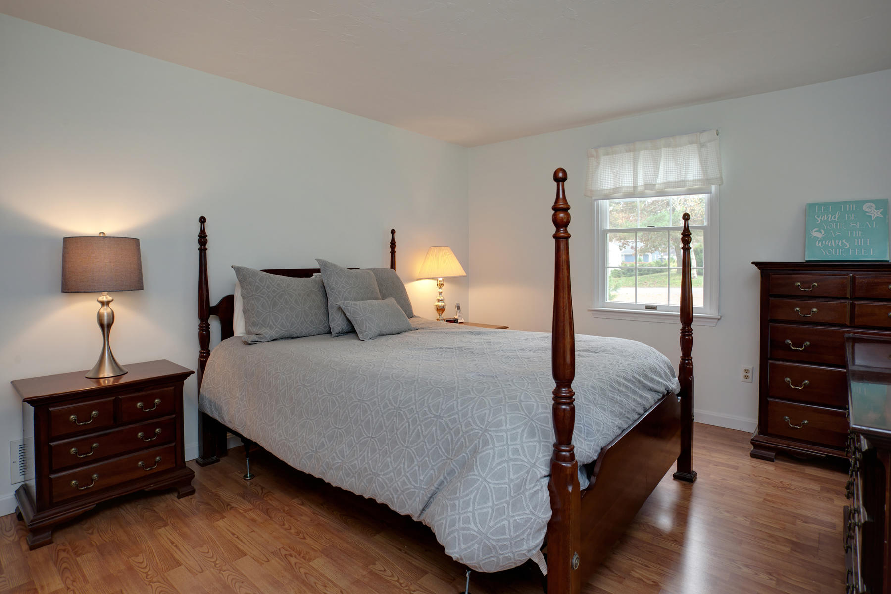 2 Timberknoll Road Pocasset, MA 02559 - Photo 13 of 26 a bedroom with a bed and wooden floor