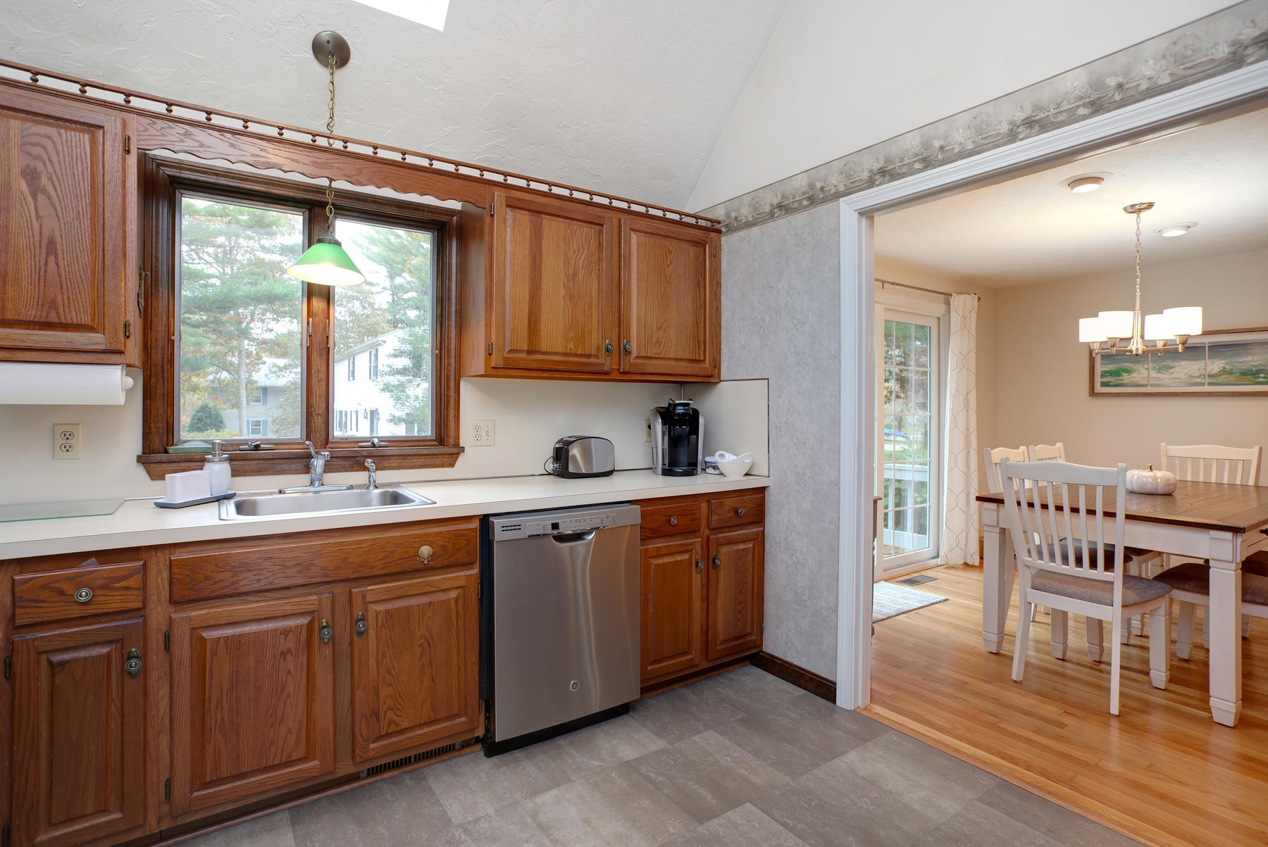 2 Timberknoll Road Pocasset, MA 02559 - Photo 4 of 26 a kitchen with a sink and cabinets