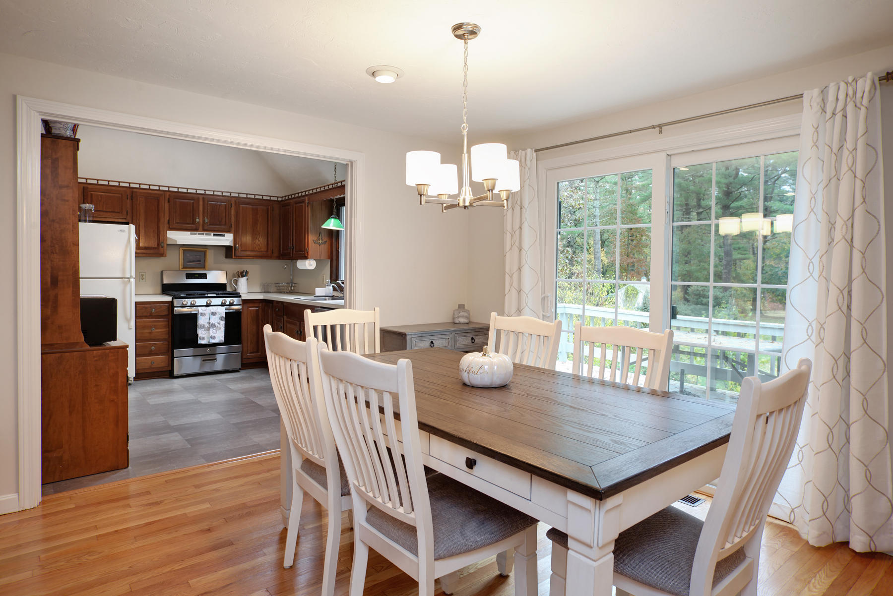 2 Timberknoll Road Pocasset, MA 02559 - Photo 5 of 26 a view of a dining room with furniture window and wooden floor