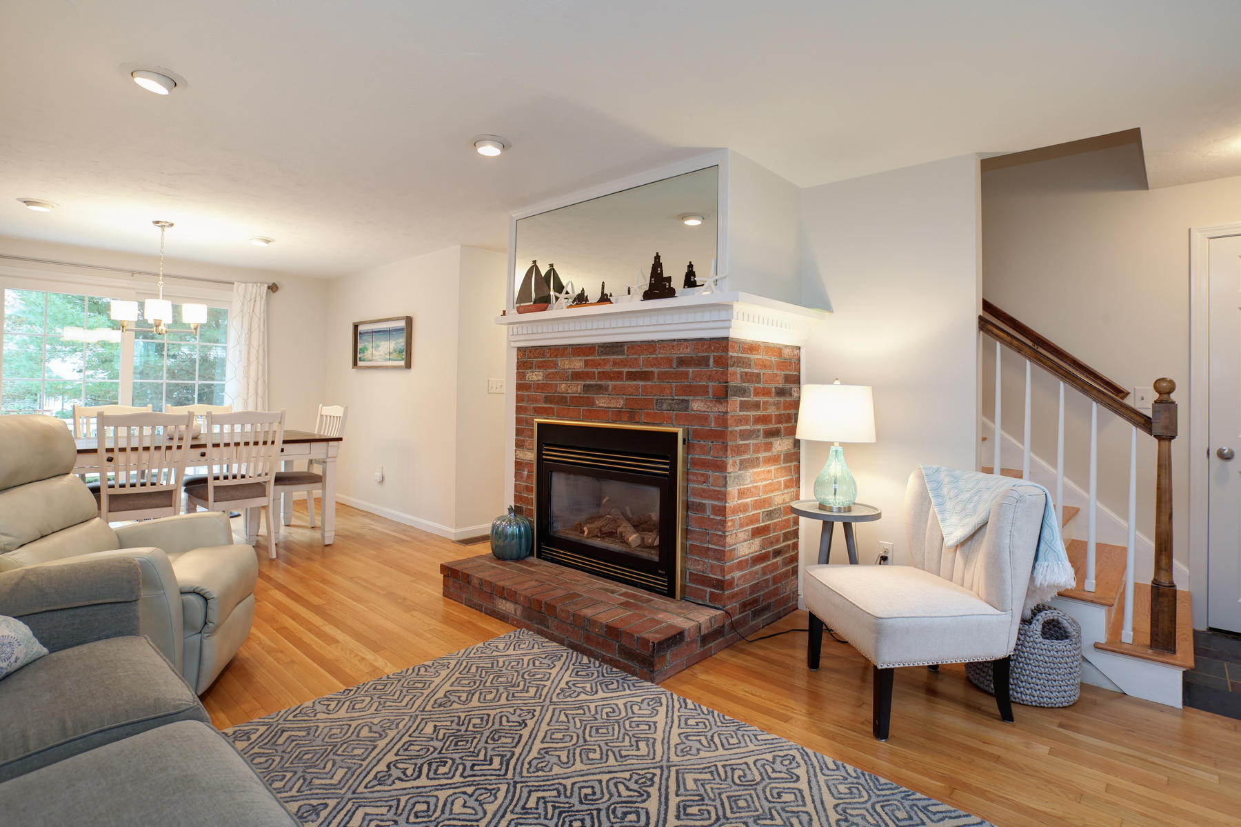 2 Timberknoll Road Pocasset, MA 02559 - Photo 7 of 26 a living room with furniture and a fireplace