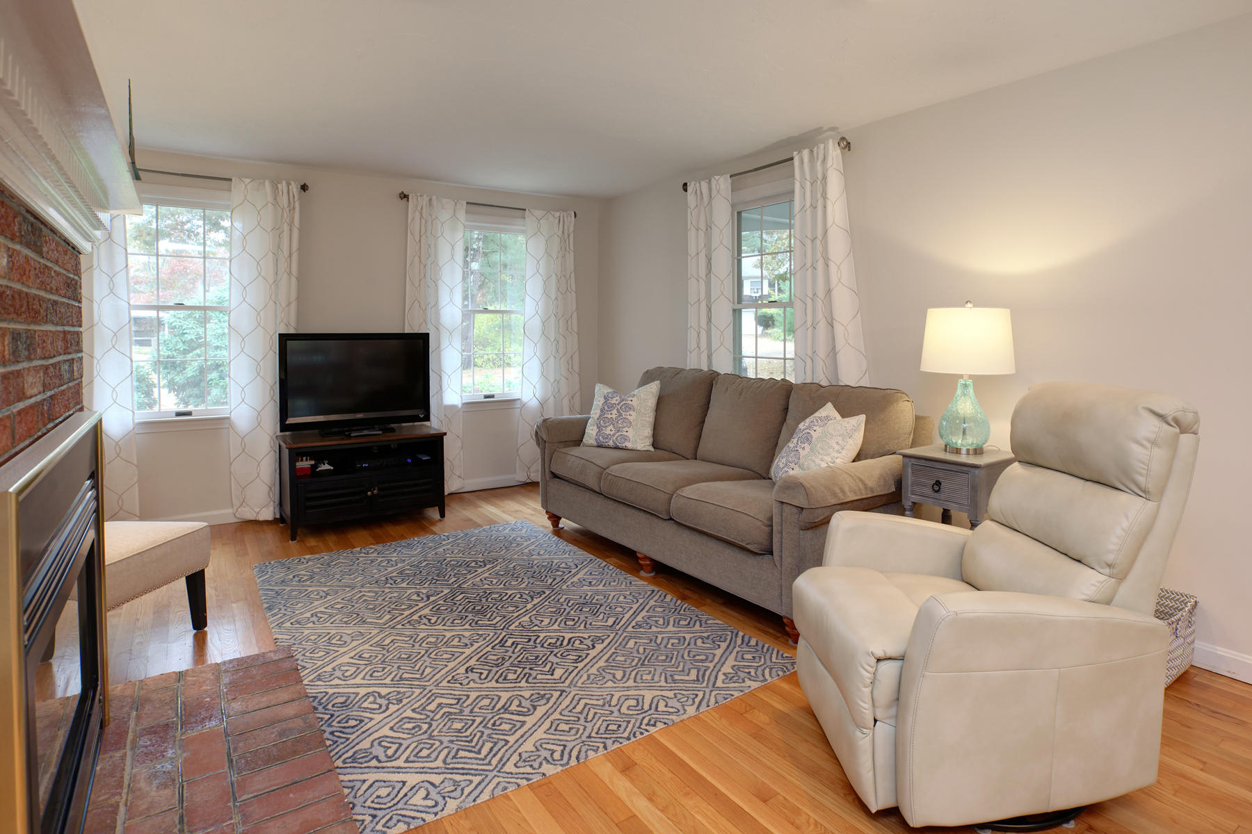2 Timberknoll Road Pocasset, MA 02559 - Photo 8 of 26 a living room with furniture and a flat screen tv
