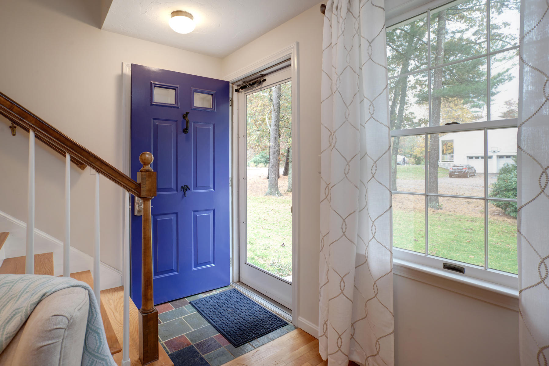 2 Timberknoll Road Pocasset, MA 02559 - Photo 10 of 26 a view of entryway with a front door and wooden floor