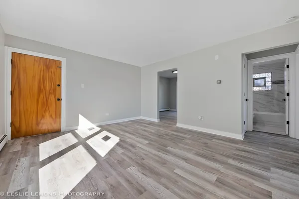 a view of an empty room and window