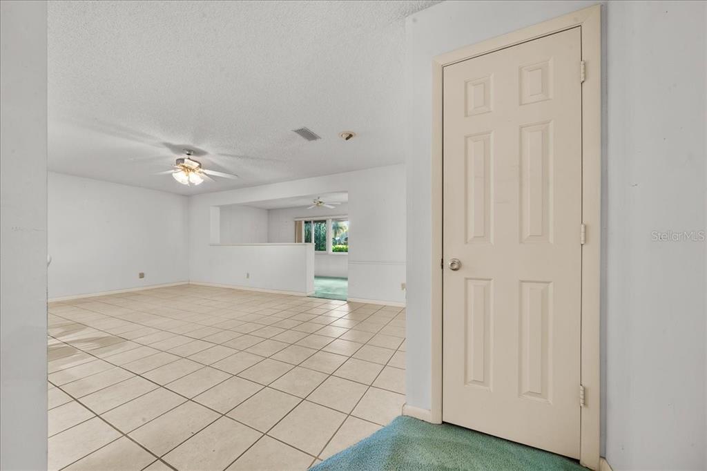 9377 Southwest 90th Court, Unit E Ocala, FL 34481 - Photo 15 of 77 a view of a livingroom with wooden floor