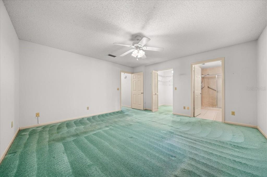 9377 Southwest 90th Court, Unit E Ocala, FL 34481 - Photo 40 of 77 a view of an empty room