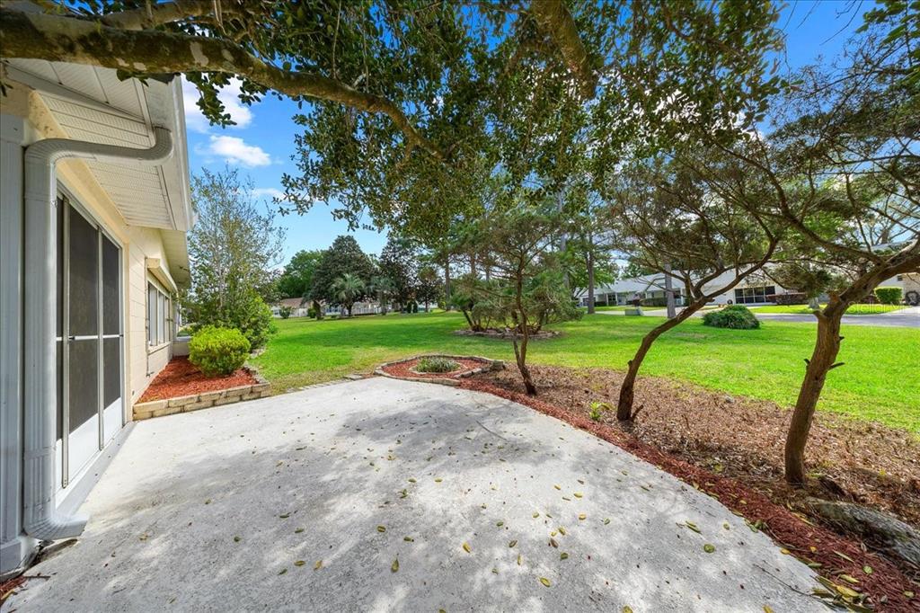 9377 Southwest 90th Court, Unit E Ocala, FL 34481 - Photo 55 of 77 a view of a park with swings and slides