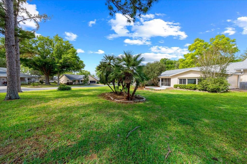 9377 Southwest 90th Court, Unit E Ocala, FL 34481 - Photo 56 of 77 a view of house with a big yard