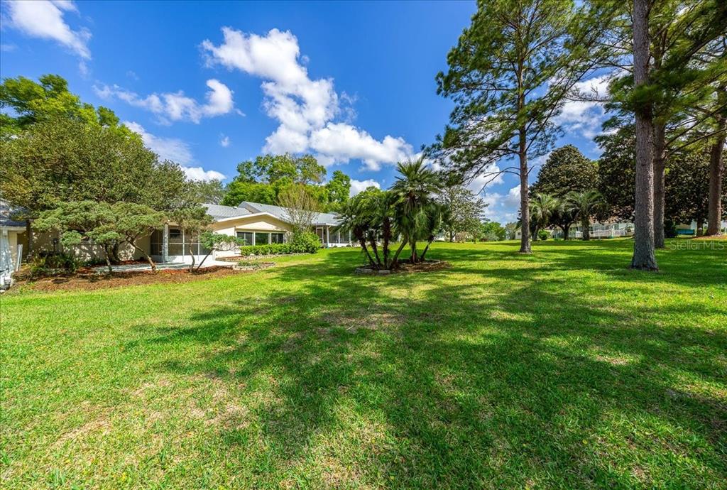 9377 Southwest 90th Court, Unit E Ocala, FL 34481 - Photo 59 of 77 a view of a volley ball court