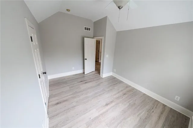 a kitchen with a sink stove and refrigerator