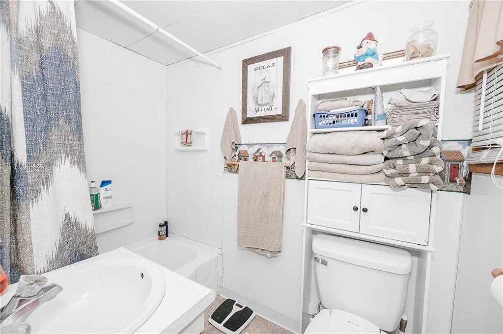 478 Exton Lake Road Apollo, PA 15613 - Photo 15 of 25 a bathroom with a sink toilet and shower