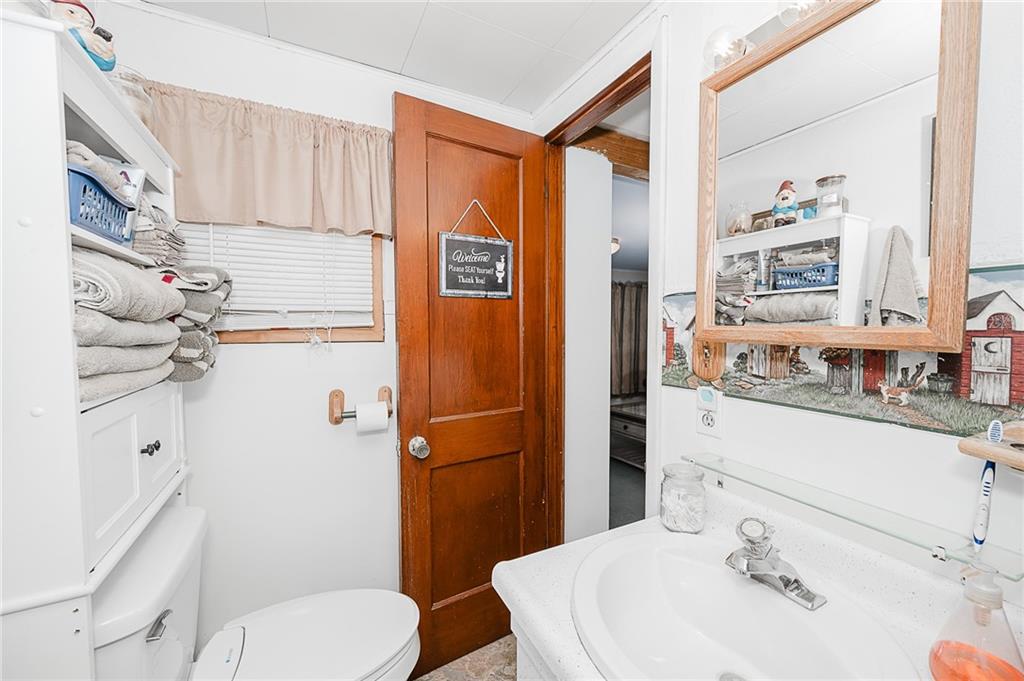 478 Exton Lake Road Apollo, PA 15613 - Photo 16 of 25 a bathroom with a sink a toilet and shower