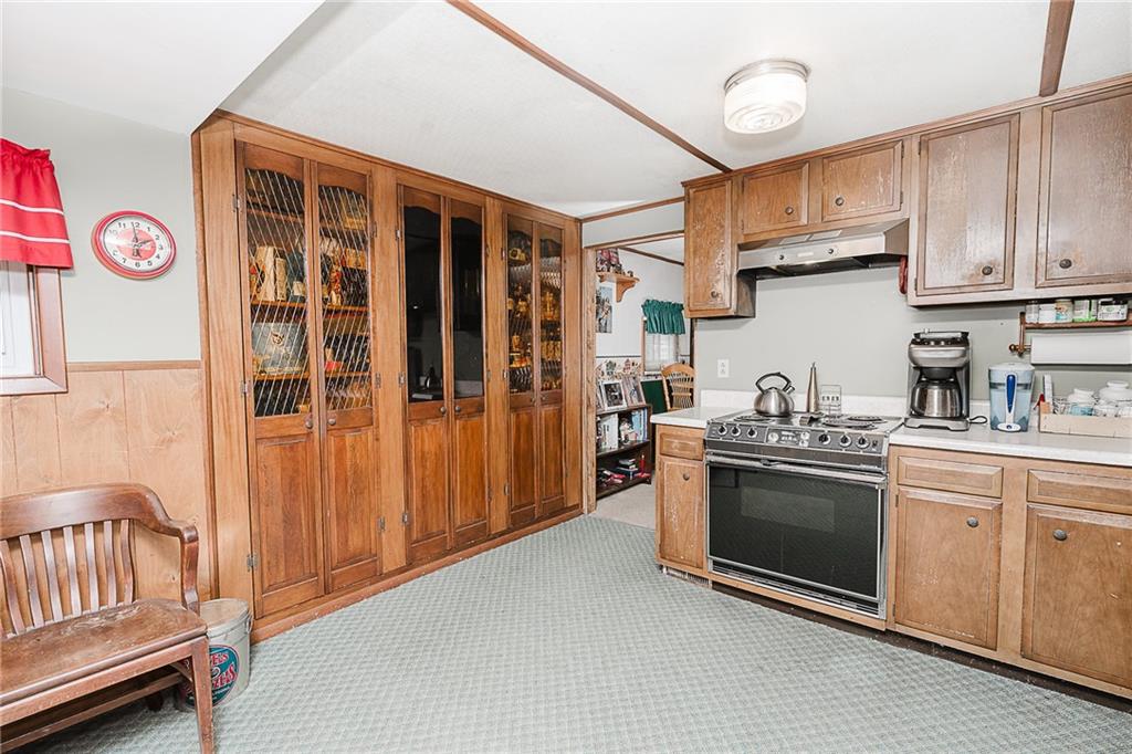 478 Exton Lake Road Apollo, PA 15613 - Photo 4 of 25 a kitchen with stainless steel appliances granite countertop a stove and a sink
