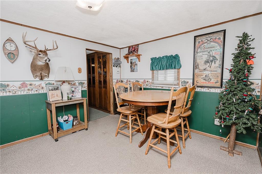 478 Exton Lake Road Apollo, PA 15613 - Photo 6 of 25 a dining room with furniture window and wooden floor